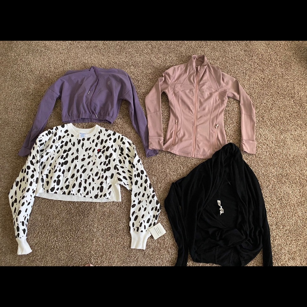 Bundle of sweaters.